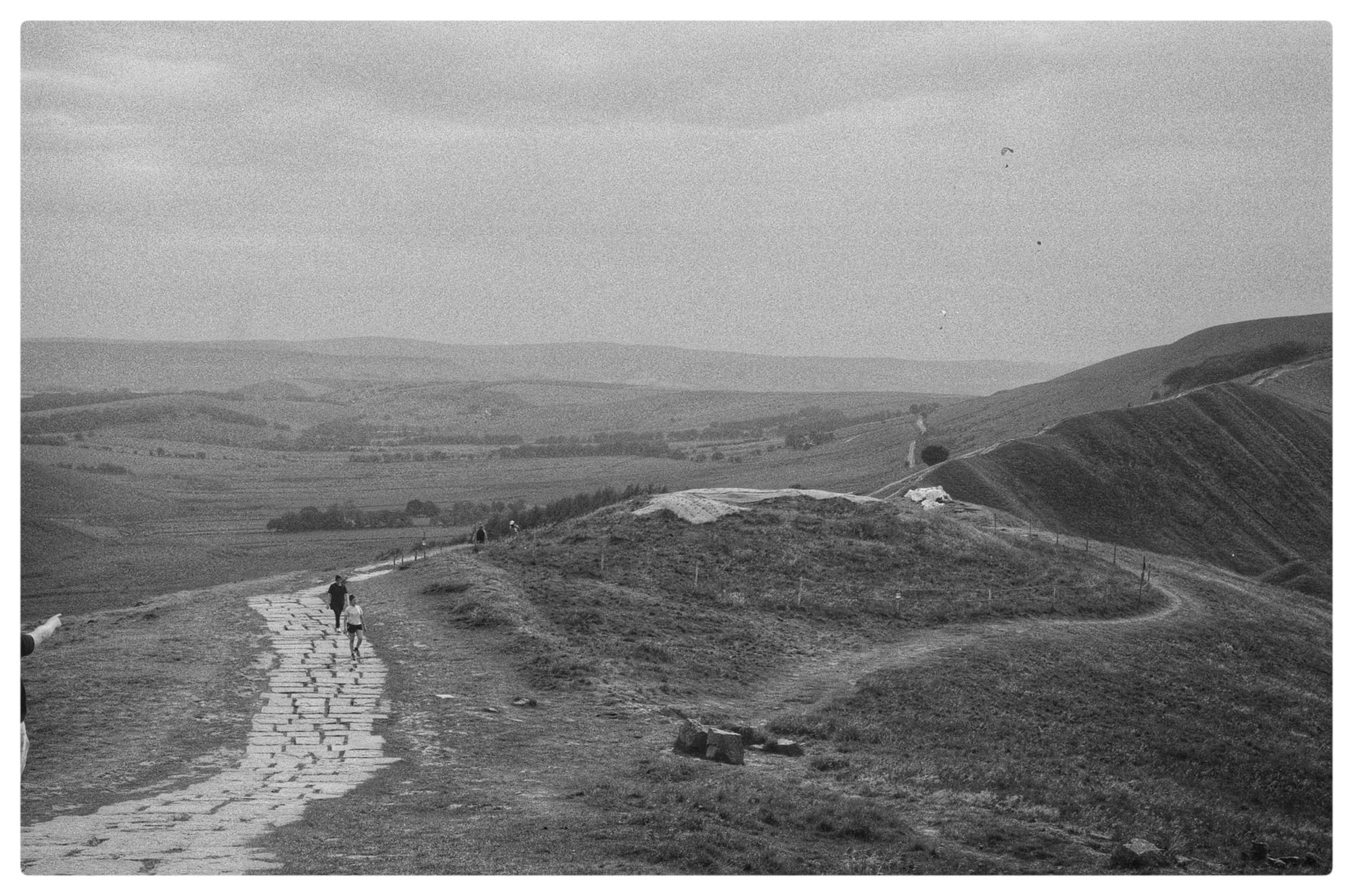 A black and white film photo of Mam Tor in the Peak District